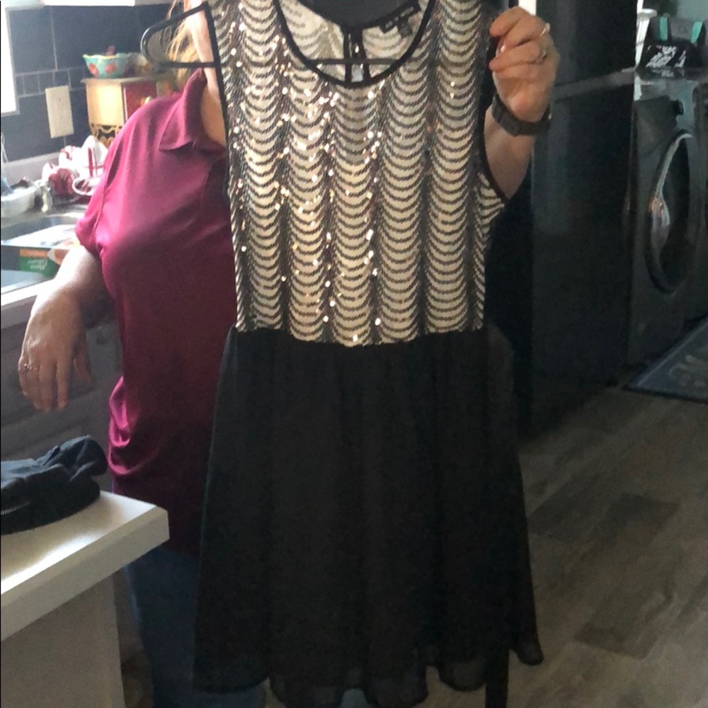 A black and white sequin semi-formal dress.